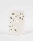 Brûle-parfum cylindrique en céramique blanche, diffuseur d'huiles essentielles, design épuré et élégant, idéal pour créer une ambiance apaisante dans votre intérieur.