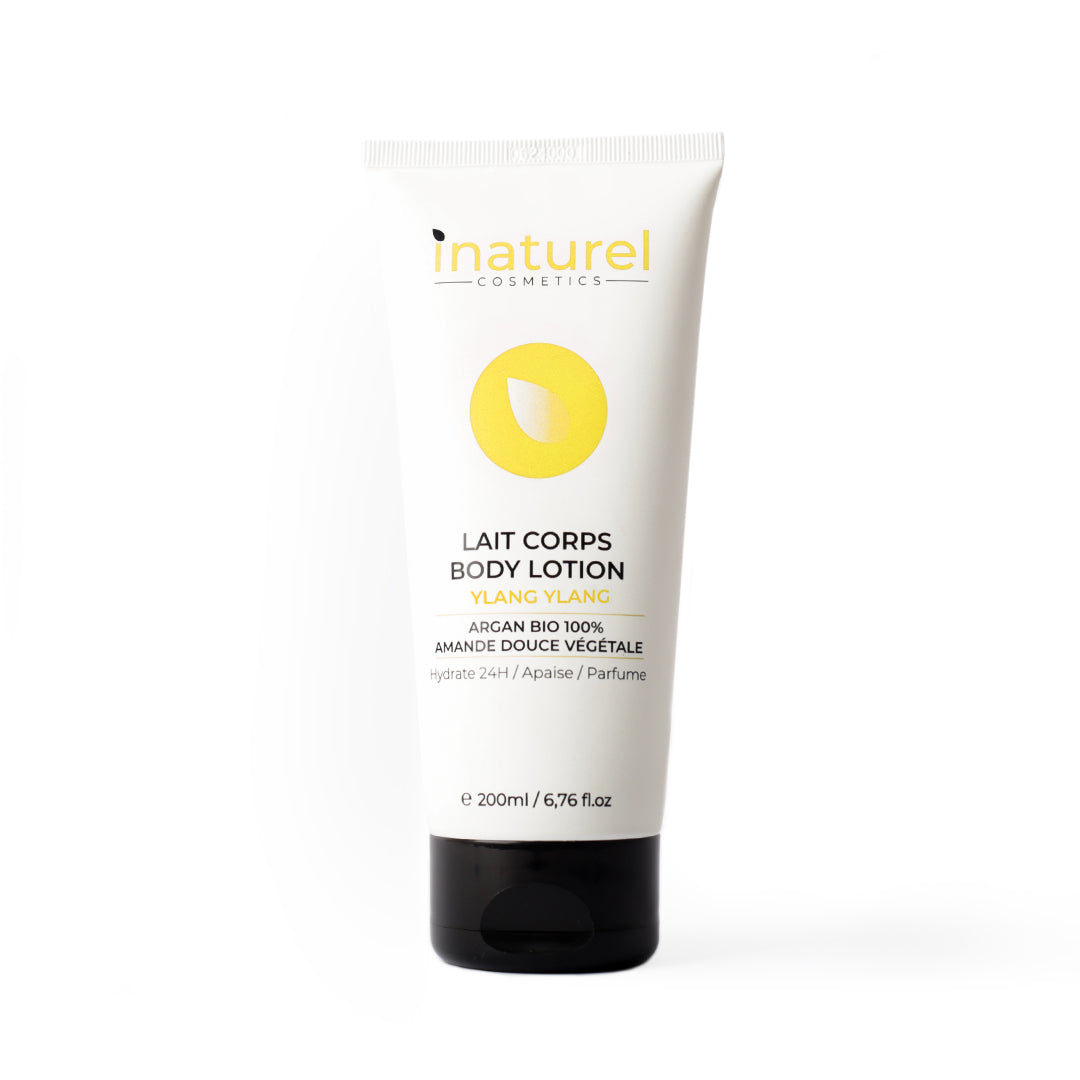Lait corps Inaturel à l'ylang ylang 200ml, hydratant et nourrissant, enrichi en huile d’argan bio et huile d’amande douce, pour une peau douce et parfumée.